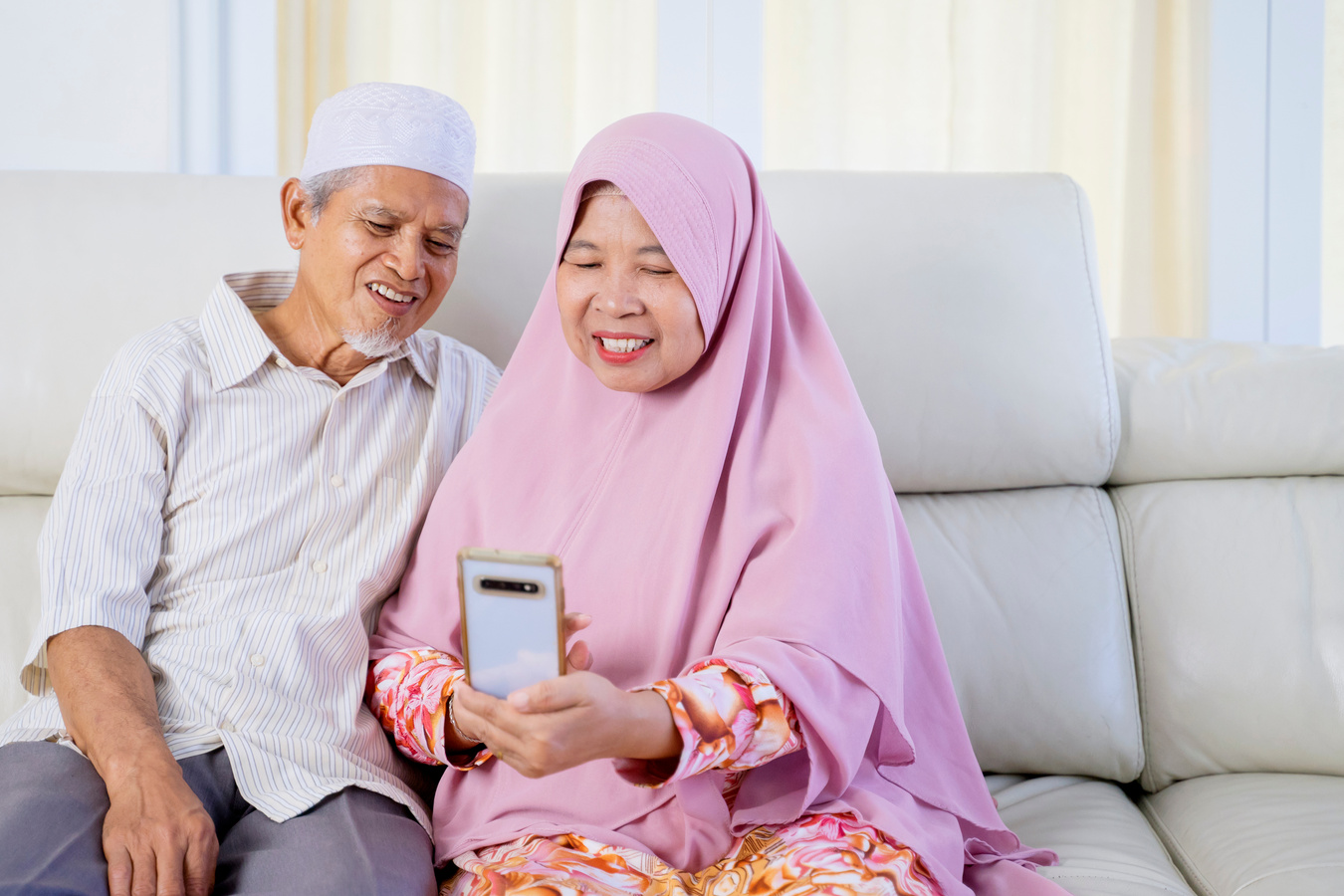Muslim Old Couple Doing Video Call with