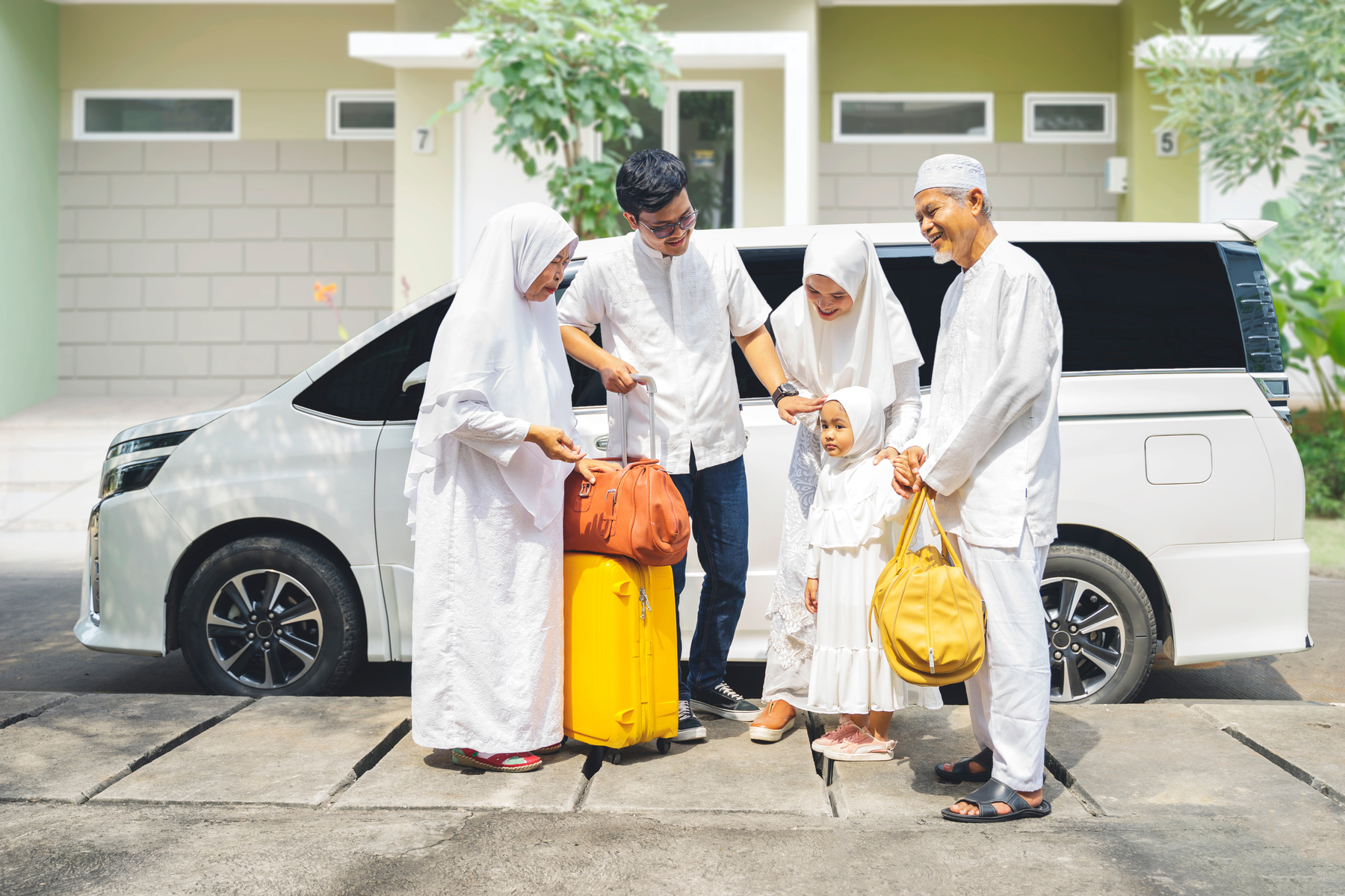 Happy Multi-Generation Muslim Family Gathering Together